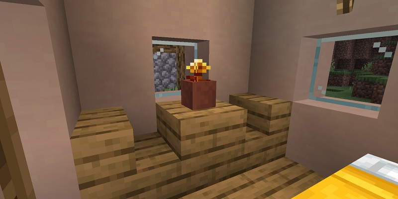 植木鉢に入れた金のタンポポ